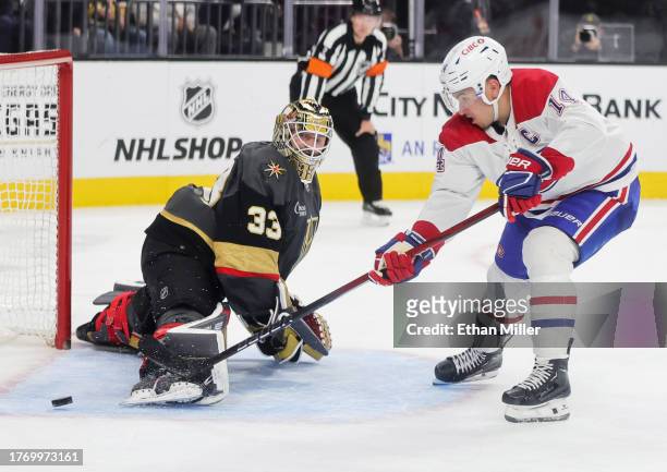 Nick Suzuki of the Montreal Canadiens scores a shootout goal against Adin Hill of the Vegas Golden Knights in overtime of their game at T-Mobile...