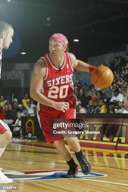 Tim McGraw drives to the basket during the Celebrity Game at NBA Jam Session during the 2003 NBA All Star Weekend at the Georgia World Congress...