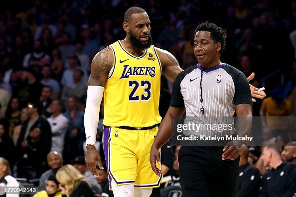 Labrone Mitchell LeBron James of the Los Angeles Lakers argues with referee Mitchell ...
