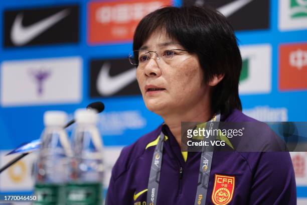 Shui Qingxia, head coach of Team China, attends a press conference after the AFC Women's Asian Olympic Qualifier Round 2 Group B match between China...