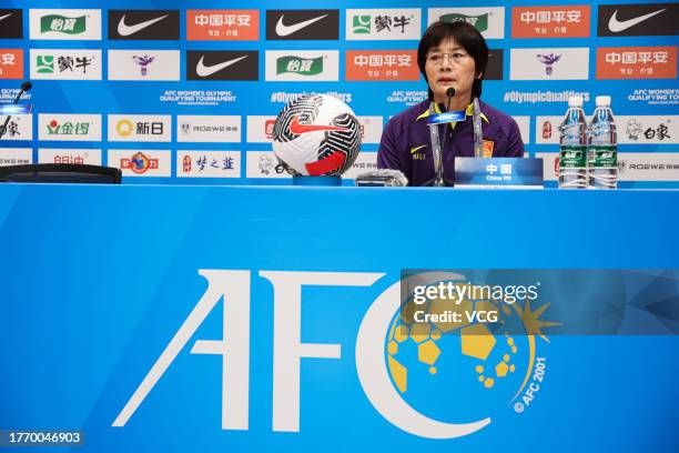 Shui Qingxia, head coach of Team China, attends a press conference after the AFC Women's Asian Olympic Qualifier Round 2 Group B match between China...