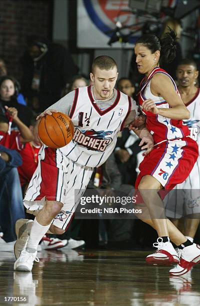 Musician Justin Timberlake drives to the basket in the Celebrity Game at NBA Jam Session during the 2003 NBA All Star Weekend at the Georgia World...