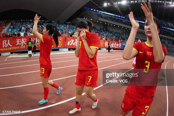 Players of China thank fans after the AFC Women's Asian Olympic Qualifier Round 2 Group B match between China and South Korea at Xiamen Egret Stadium...