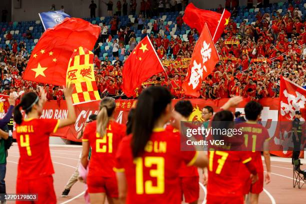 Players of China thank fans after the AFC Women's Asian Olympic Qualifier Round 2 Group B match between China and South Korea at Xiamen Egret Stadium...