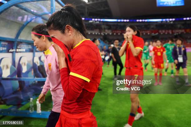 Players of China react after the AFC Women's Asian Olympic Qualifier Round 2 Group B match between China and South Korea at Xiamen Egret Stadium on...