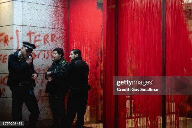 Police arrive to arrest activists from Palestine Action for spraying paint over the London offices of the Arms Company Leonardo which supplies...