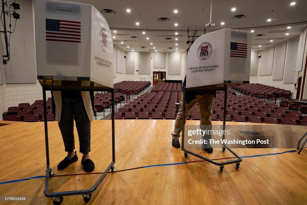 LEESBURG, VA - NOVEMBER 7: Citizens cast votes at Harper Park M