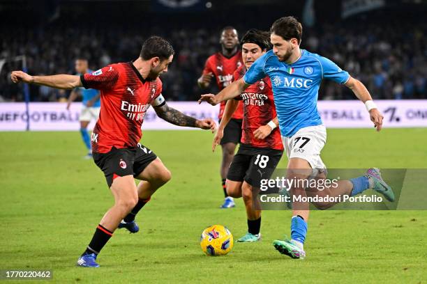 Davide Calabria, Luka Romero of AC Milan and Khvicha Kvaratskhelia of SSC Napoli during the Serie A football match between SSC Napoli and AC Milan at...