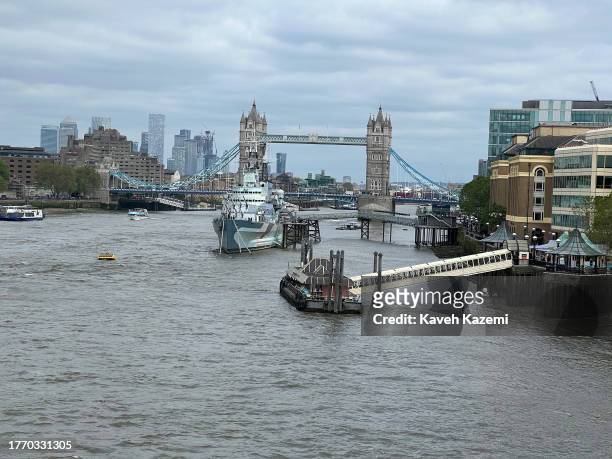 Distant view of London Bridge on the River Thames on May 30, 2023 in London, United Kingdom.
