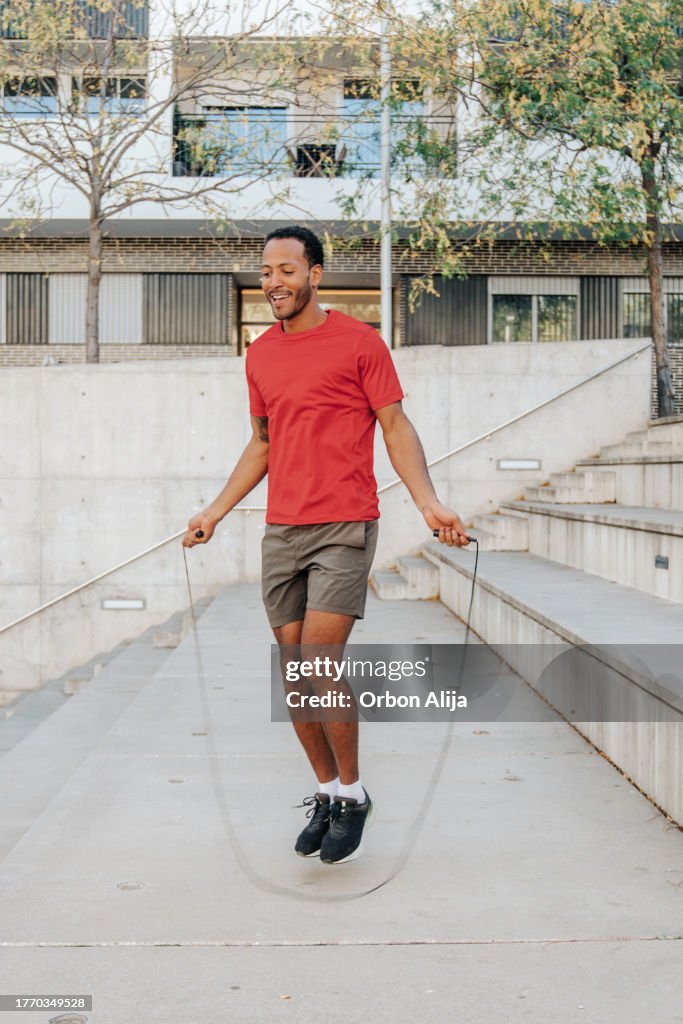 Jump Rope Cities Fit Man Jumping Rope In The City High-Res Stock Photo - Getty Images