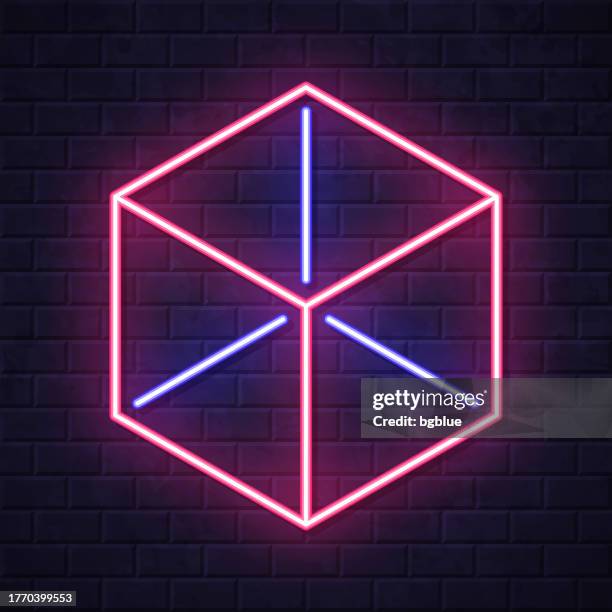 isometric cube. glowing neon icon on brick wall background - cube icon editable stock illustrations