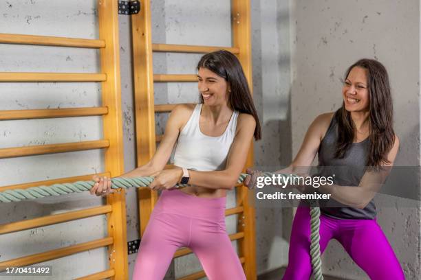 Friends Rope Pull Women Pulling Rope Workout High-Res Stock Photo - Getty Images