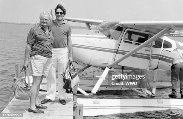 Raul Julia Sr. And his son Raul Julia attend a party at the home of Jonathan and Kimberly Farkas in Water Mill, New York, on August 2, 1982.