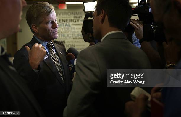 Virginia Governor Bob McDonnell answers questions from members of the press after he spoke during an event regarding the launch of the "Veterans...