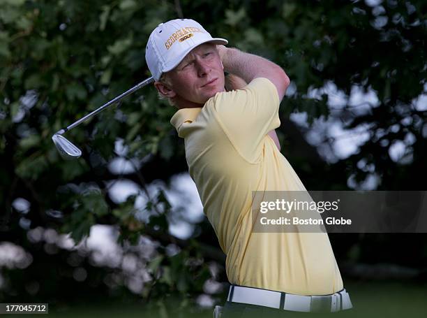 Anders Albertson from Georgia Tech watches the flight of his tee shot on the seventh hole during the 2013 US Amateur at The Country Club in...