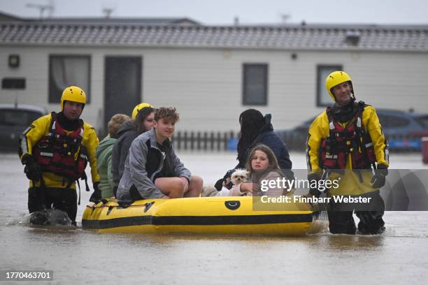 People are rescued from their holiday chalets by fire and rescue at Freshwater Beach Holiday Park, on November 02, 2023 in Burton Bradstock, Dorset....