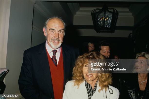 Sean Connery and wife Micheline Roquebrune attend AT&T Pebble Beach Pro-Am Golf Tournament, United States, circa 1990s.