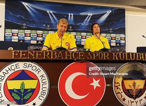 Arsenal manager Arsene Wenger and midfielder Tomas Rosicky during a Press Conference ahead of their UEFA Champions League Play Off match against...