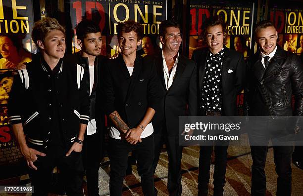 Simon Cowell with Niall Horan, Zayn Malik, Louis Tomlinson, Harry Styles and Liam Payne from One Direction attend the "One Direction This Is Us"...