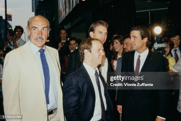 Sean Connery, Charles Martin Smith, Kevin Costner and Andy Garcia speaks to a reporter at "The Untouchables" New York City premiere, held at the...
