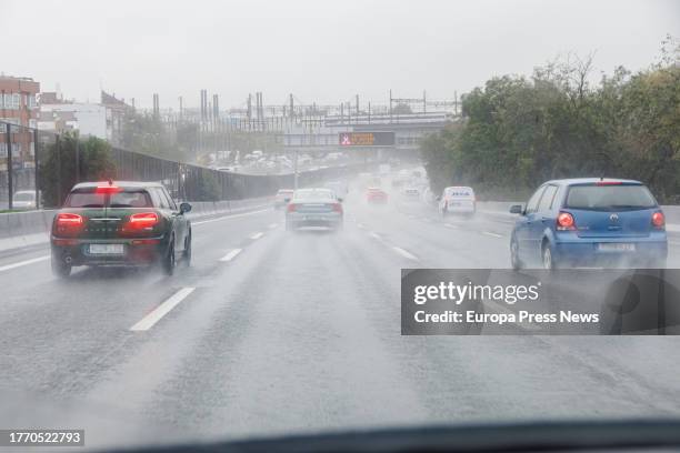 Several cars drive in the rain, on 02 November, 2023 in Madrid, Spain. The State Meteorological Agency has activated the red alert in Madrid for...