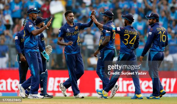 Dushmantha Chameera of Sri Lanka celebrates the wicket of KL Rahul of India during the ICC Men's Cricket World Cup India 2023 between India and Sri...