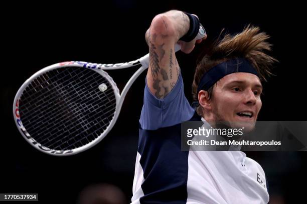 Alexander Bublik of Kazakhstan returns a forehand in his match against Grigor Dimitrov of Bulgaria during Day Four of the Rolex Paris Masters ATP...