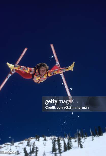 Sporting Look: Portrait of hot dog skiier Bob Theobald in action, spread eagle somersault wearing Head parka and nylon pants during photo shoot at...