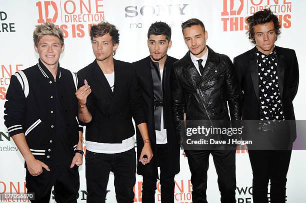 Niall Horan, Louis Tomlinson, Zayn Malik, Liam Payne and Harry Styles of One Direction attend the world premiere of 'One Direction - This Is Us' at...