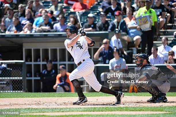 Jeff Keppinger of the Chicago White Sox bats as Bryan Holaday of the Detroit Tigers catches at U.S. Cellular Field on August 14, 2013 in Chicago,...