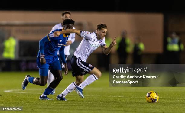 Bolton Wanderers' Dion Charles breaks away from Shrewsbury Town's Nohan Kenneh during the Sky Bet League One match between Shrewsbury Town and Bolton...