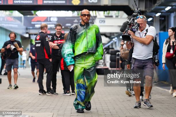 Lewis Hamilton of Great Britain and Mercedes enters the paddock during previews ahead of the F1 Grand Prix of Brazil at Autodromo Jose Carlos Pace on...