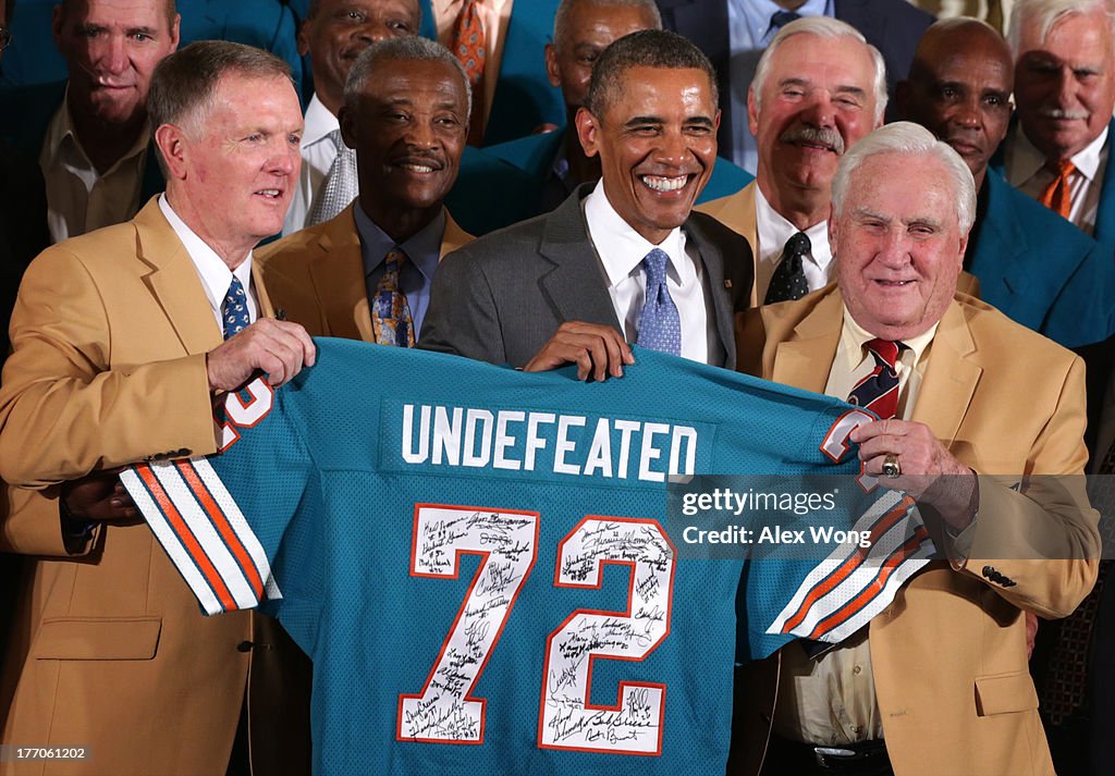 President Obama Hosts The 1972 Superbowl Champion Miami Dolphins