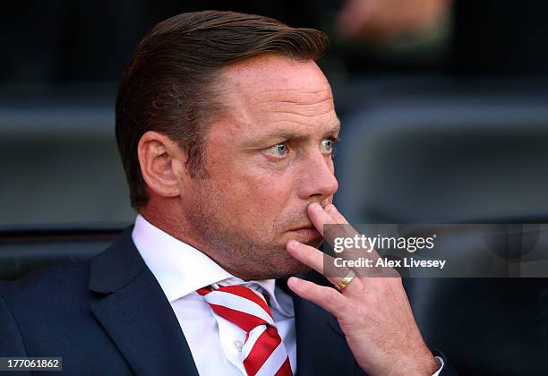 Paul Dickov the manager of Doncaster Rovers looks on during the Sky Bet Championship match between Wigan Athletic and Doncaster Rovers at DW Stadium...