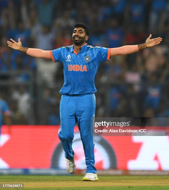 Jasprit Bumrah of India celebrates the wicket of Pathum Nissanka of Sri Lanka during the ICC Men's Cricket World Cup India 2023 between India and Sri...