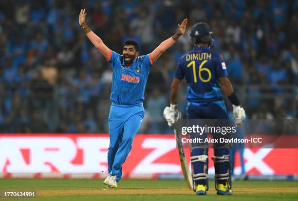 Jasprit Bumrah of India celebrates the wicket of Pathum Nissanka of Sri Lanka during the ICC Men's Cricket World Cup India 2023 between India and Sri...