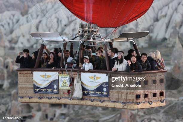 General view of a hot air balloon, almost 556,306 local and foreign tourists get on within January-October period of this year, gliding over the...