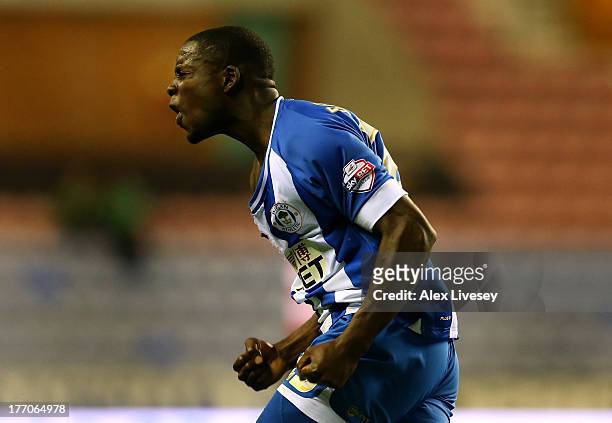 Leon Barnett of Wigan Athletic celebrates after scoring the equalising goal against Doncaster Rovers during the Sky Bet Championship match between...