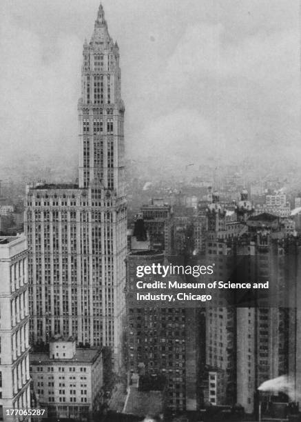 The Cathedral Of Commerce - black and white photograph showing an image giving a distant view looking up from Broadway, of the entire Woolworth...