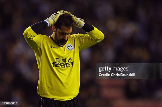 Scott Carson of Wigan Athletic reacts during the Sky Bet Championship match between Wigan Athletic and Doncaster Rovers at DW Stadium on August 20,...