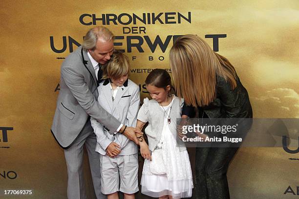 Director Harald Zwart, his wife Veslemoy and their children attend the 'The Mortal Instruments: City of Bones' Germany premiere at Sony Centre on...