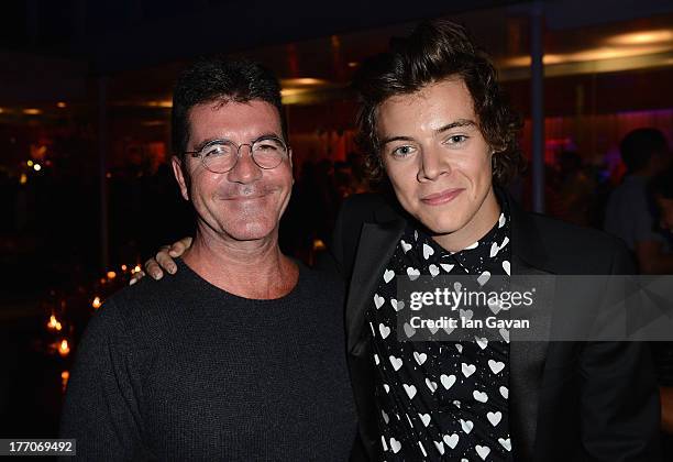 Simon Cowell and Harry Styles attend the "One Direction This Is Us" world premiere after party on August 20, 2013 in London, England.