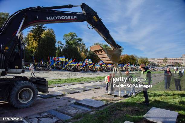 The process of dismantling Soviet memorial plaques on the Field of Mars of the Lychakiv Cemetery in Lviv. The Field of Mars is part of the Lychakiv...