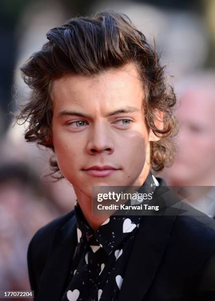 Harry Styles of One Direction attends the World Premiere of 'One Direction: This Is Us' at Empire Leicester Square on August 20, 2013 in London,...