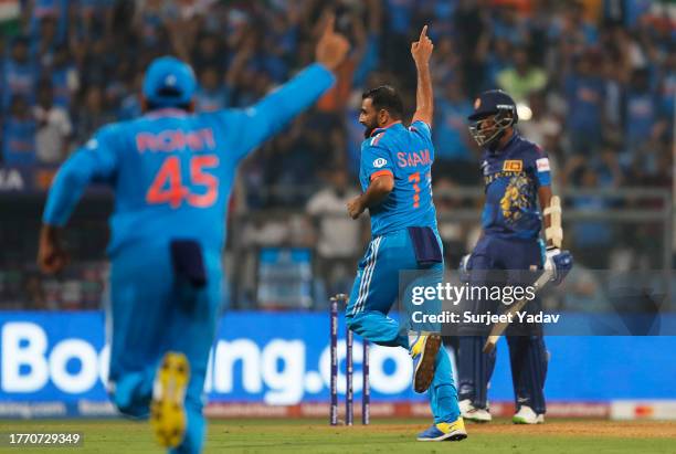 Mohammed Shami of India celebrates the wicket of Dushan Hemantha of Sri Lanka during the ICC Men's Cricket World Cup India 2023 between India and Sri...