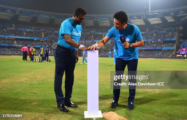 Sachin Tendulkar and Muttiah Muralitharan take part in a UNICEF activation During UNICEF One Day 4 children as the Wankhede Stadium turns blue during...