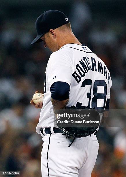 Jeremy Bonderman of the Detroit Tigers stands on the mound after giving up a solo home run to Pedro Florimon of the Minnesota Twins in the sixth...