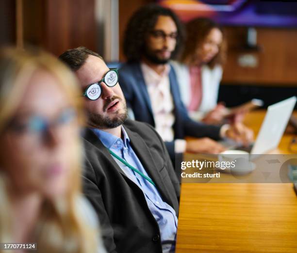 hangover at the office - blind spot stock pictures, royalty-free photos & images