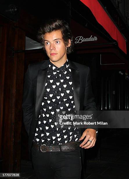 Harry Styles leaves Soho House following the 'One Direction This Is Us' World Premiere on August 20, 2013 in London, England.