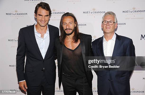 Bob Sinclar, Professional Tennis Player Roger Federer, and Moet & Chandon CEO Stephane Baschiera attend Moet & Chandon Celebrates Its 270th...
